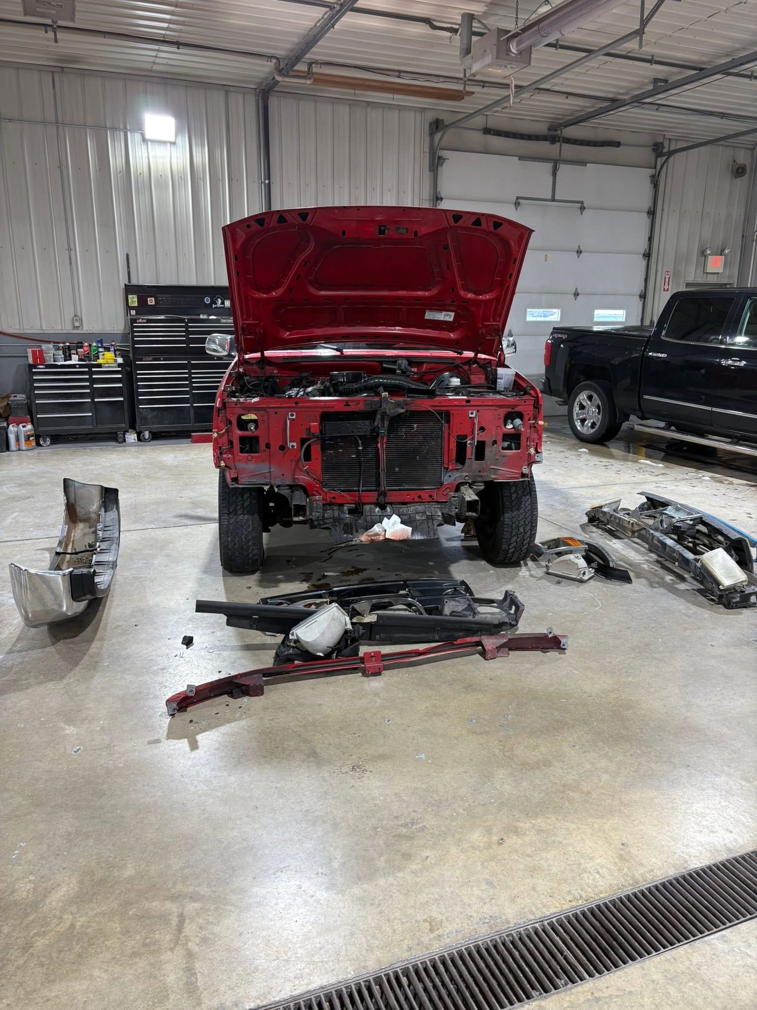 Front-end components removed during the repair process, allowing our team to access and complete the necessary repairs before reassembly.