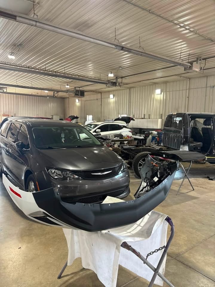 Body Repair & Reassembly — Auto body components prepared as a vehicle moves through the repair and reassembly process at Adams County Collision & Repair.